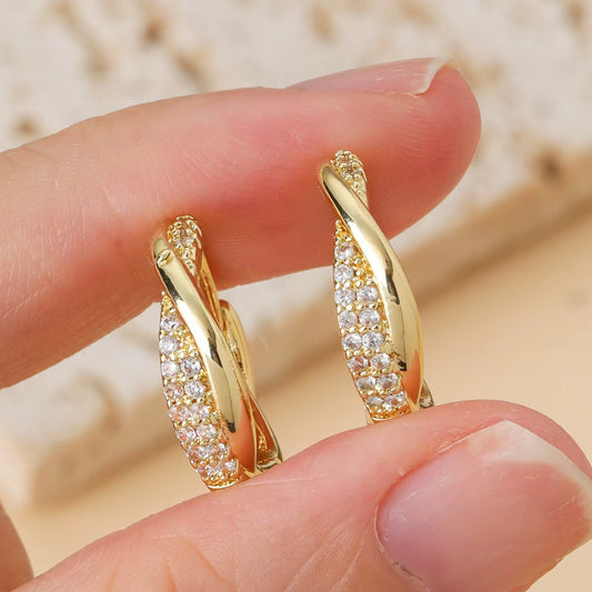 Boucles d'oreilles créoles torsadées en zircon